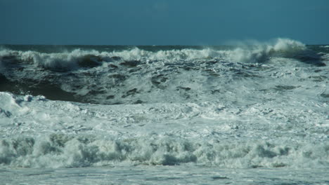 Massive-waves-crashing-during-large-winter-swell-in-Half-Moon-Bay,-CA-near-Mavericks