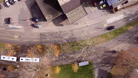 Aerial-panning-top-down-drone-view-of-a-truck-going-in-a-road,-street-travel-concept,-Sankt-Gallen,-Switzerland