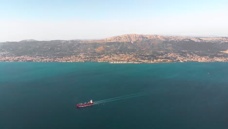Croatia-Coastline-with-Cargo-Ship-in-Adriatic-Sea
