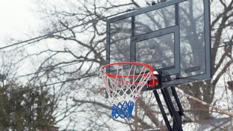 Lonely-Basketball-Hoop-Waiting-in-the-Snow