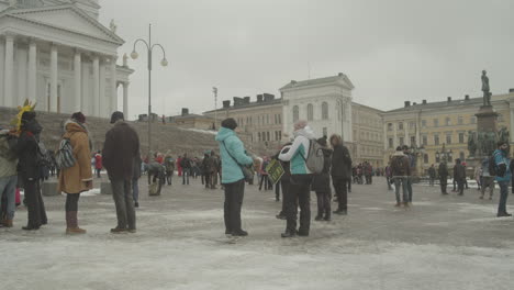 Crowd-of-people-are-preparing-for-a-protest-Senate-square-in-Helsinki