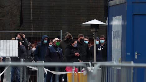 People-queuing-outside-a-covid-19-coronavirus-vaccination-test-centre,-Slovakia