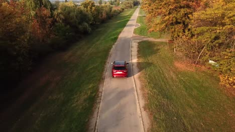Aerial-view-of-a-Ford-Kuga-car-speeding-on-a-country-road
