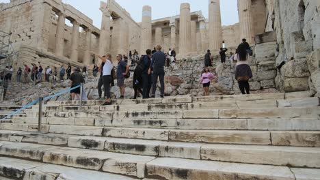 Athens,-Greece---October-12,-2021:-A-crowd-of-tourists-storm-the-Acropolis-after-its-opening
