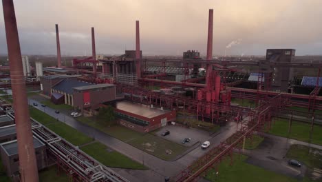 Zeche-Zollverein-Coking-Plant,overcast-wet-morning,-aerial-drone-crane-shot