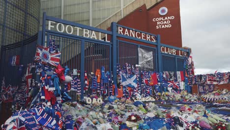 A-wide-shot-of-tributes-to-Rangers-FC-legend,-Walter-Smith