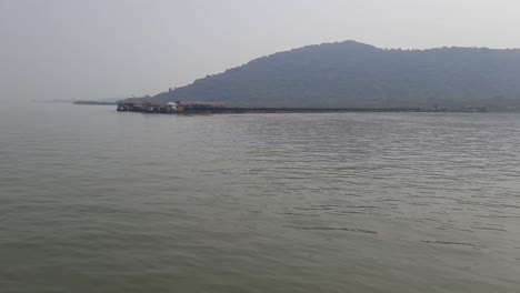The-tourist-ferry-boat-is-reaching-Elephanta-Island-Harbor-Port-in-India---Gateway-Of-India-To-Elephanta-Caves
