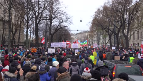 POV-view-walking-with-anti-corona-protestors-in-Vienna,-Austria
