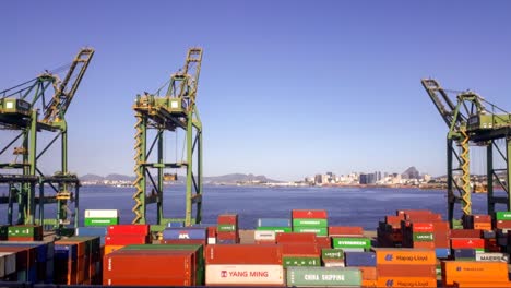 colourful-containers-on-seaside-port-and-logistics-terminal-with-cranes