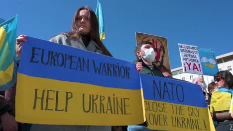 Protesters-hold-a-placard-with-the-message-"European-Warriors,-Help-Ukraine"-and-"Nato,-Close-the-Sky-Over-Ukraine"-during-a-rally-against-the-Russian-invasion-of-Ukraine-in-Spain