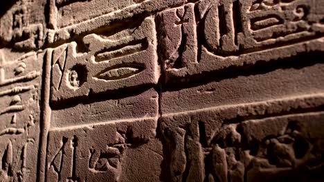 Close-details-of-hieroglyphs-on-the-walls-inside-the-temple-of-Philae,-Aswan,-Egypt