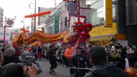 February-24,-2018,-Tokyo,-Japan---Dragon-dance-troupe-perform-during-the-Chinese-New-Year-Parade-2018-in-Yokohama's-Chinatown