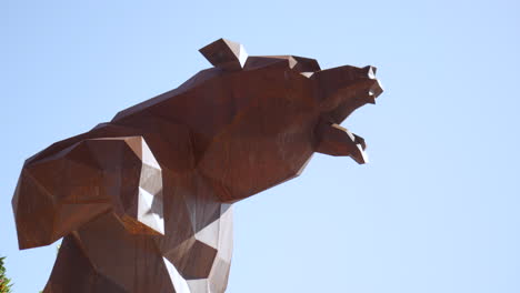 Life-sized-brown-bear-metal-sculpture-in-an-aggressive-stance