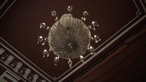 luxury-old-chandelier-in-an-old-mansion-with-camera-movement-2