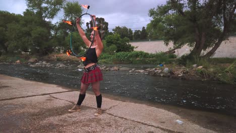 Static-shot,-young-female-fire-performer-that-was-entertaining-crown,-at-Los-Angeles-River