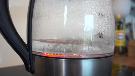 boiling-water-bubbles-in-a-glass-kettle