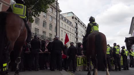 Antifa-gather-outside-the-BBC-studio-to-protest-Tommy-Robinson-in-London,-UK