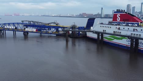 Stena-Line-freight-ship-vessel-zoom-in-to-loading-cargo-shipment-from-Wirral-terminal-Liverpool-aerial-view