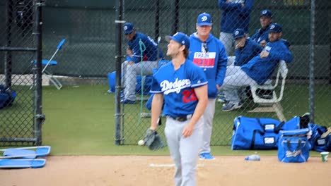 Clayton-Kershaw-Not-Happy-with-Pitch-in-Bullpen-Session-during-Los-Angeles-Dodger's-Baseball-Spring-Training-in-Glendale,-Arizona-with-Pitching-Coach-Rick-Honeycutt