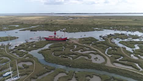Aerial-track-above-Tollesbury-marina-looking-out-over-the-marsh