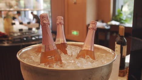 3-Champagne-bottle-in-ice-bucket-in-hotel-restaurant-buffet