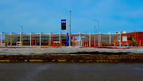 Closeup-view-of-the-new-fenced-in-ETS-public-transit-station-rail-part-of-the-new-extended-line-called-MILLWOODS-in-the-Southside-of-Edmonton-just-steps-from-the-Millwoods-town-Center-shopping-mall