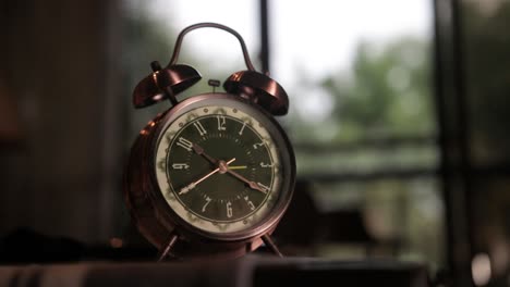 Retro-Nostalgic-Analog-Twin-Bell-Alarm-Clock-with-Second-Hand-Moving,-Blurred-Background,-4K