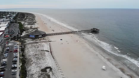tybee-island-beach-pier-parking-tourism-vacation-atlantic-ocean-aerial-drone
