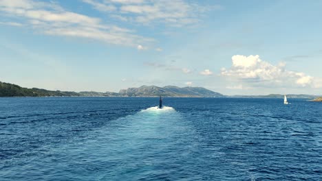 Passing-behind-Norwegian-NATO-submarine-heading-for-Haakonsvern-naval-base---Norway