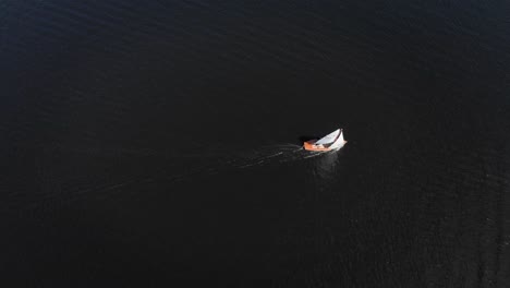 Aerial:-sailboat-on-water,-fun-summer-sailing-leisure-activity
