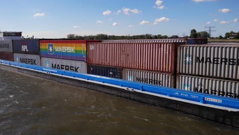 Containers-Packed-In-Cargo-Ship-Of-Mercur-Travels-In-Kinderdijk-Waters-In-Netherlands
