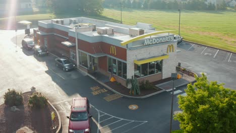 Cars-in-McDonald's-drive-thru-ordering-breakfast