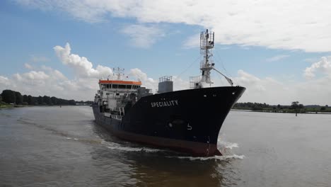 Low-Aerial-Forward-Bow-View-Of-Speciality-Oil-Tanker-Navigating-Oude-Maas
