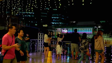 Promenaders-enjoying-a-light-show-in-a-pre-lockdown-Cebu-City-mall-night-scene-during-New-Year-2020-season