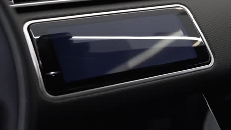 folding-screen-in-modern-land-rover-velar-car,-luxury-car