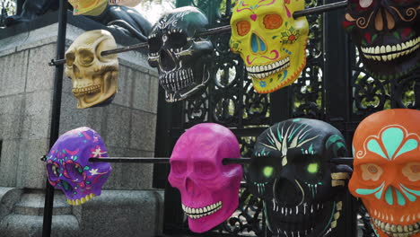Colorful-Mexican-Day-of-The-Dead-skulls-on-display-outside-the-famous-Chapultepec-Park-in-Mexico-City