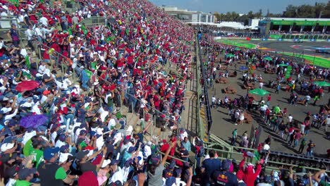 Grandstand-Foro-Sol-Auditorium-completely-crowded-with-Mexican-Fans-Cheering-supporting-encouraging-Sergio-Checo-Perez-at-the-F1-GP-Grand-Prix-in-Mexico-City-circuit