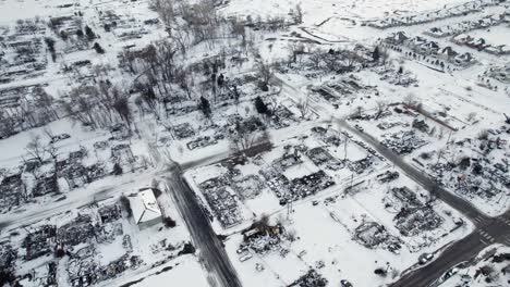 Drone-Aerial-View-of-Burnt-Down-Destroyed-Neighborhood-Blocks-and-Dead-Trees-in-Superior-Colorado-Boulder-County-USA-After-Marshall-Fire-Wildfire-Disaster