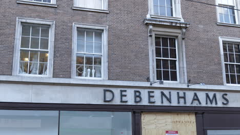 Closed-Debenhams-shop-with-boarded-windows-and-doors