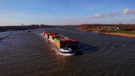 Inland-Motor-Freighter-Millennium-Carrying-Cargo-Containers-Along-Oude-Maas