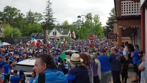 Soccer-fanatics-from-Italy-swarming-on-the-streets-while-waving-Italian-flags