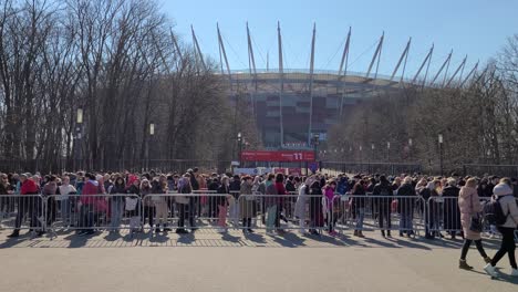 Ukrainian-Refugees-Lining-up-at-PGE-Naradowy-Stadium-in-Poland