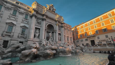Slow-motion-shot-of-Trevi-Fountain-at-Piazza-di-Trevi-during-sunset-in-Rome