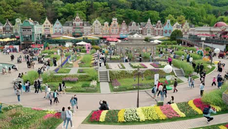 People-visit-Everland-Theme-park-in-Yongin-city,-South-Korea---elevated-wide-view