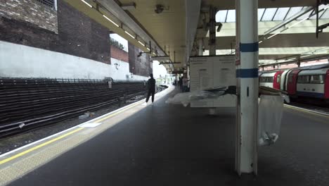 Empty-See-Through-Bin-Bag-Waving-In-The-Wind-On-The-Platform-On-Finchley-Road-Station-In-London-On-12-May-2022