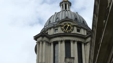 Close-Up-shot-of-the-historic-turret-clock-located-in-the-dome-above-the-Chapel-at-the-Old-Royal-Naval-College-in-Greenwich,-London,-England