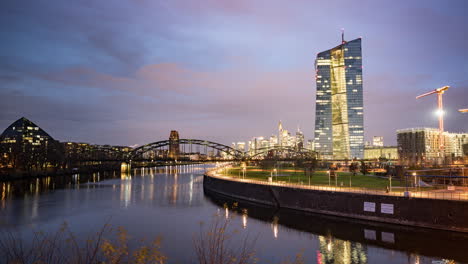 Moving-clouds-over-European-Central-Bank-and-Frankfurt-city-skyline-at-dawn