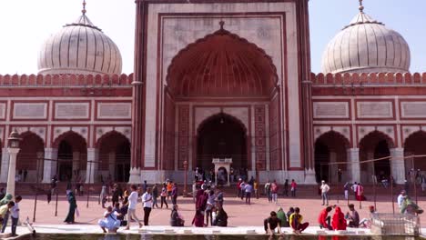 ancient-mosque-with-people-and-bright-sky-at-morning-from-unique-perspective-video-is-taken-at-jama-masjid-delhi-india-on-Mar-30-2022