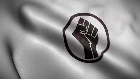 Angled-view-of-the-White-and-Black-Fist-of-Power-Flag-flapping-in-HD
