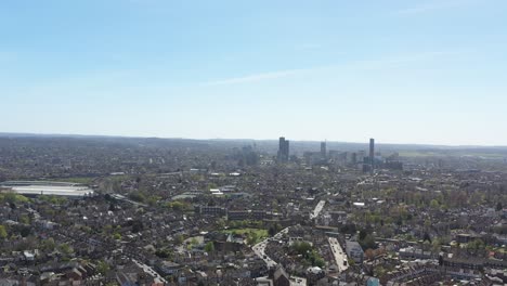 High-slider-drone-shot-of-Croydon-suburban-London-on-a-sunny-day